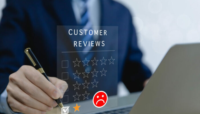 Customer Review Experience Dissatisfied Selection of 1-star rating reviews on smartphone screens. negative feedback concept Unhappy businessman, poor service, or poor quality.