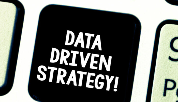 Word writing text Data Driven Strategy. Business concept for decisions based on data analysis and interpretation Keyboard key Intention to create computer message pressing keypad idea