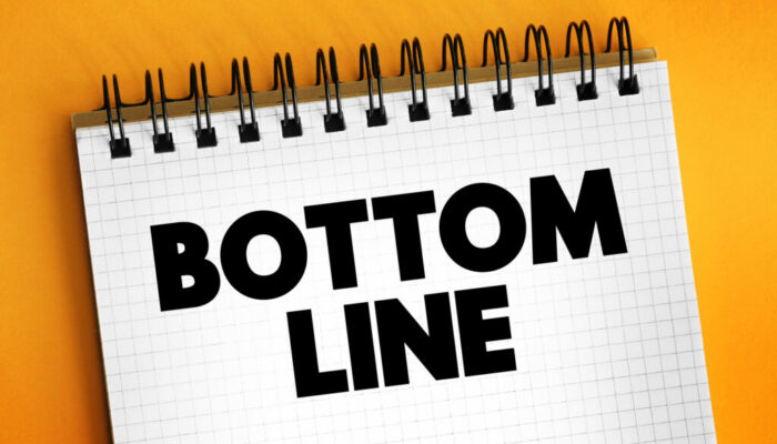 Bottom line - the final total of an account or balance sheet, text concept on notepad