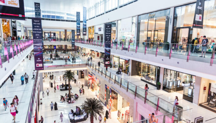 DUBAI, UAE - NOVEMBER 14: Shoppers at Dubai Mall on Nov 15, 2012 in Dubai. At over 12 million sq ft, it is the world's largest shopping mall based on total area and 6th largest by gross leasable area.