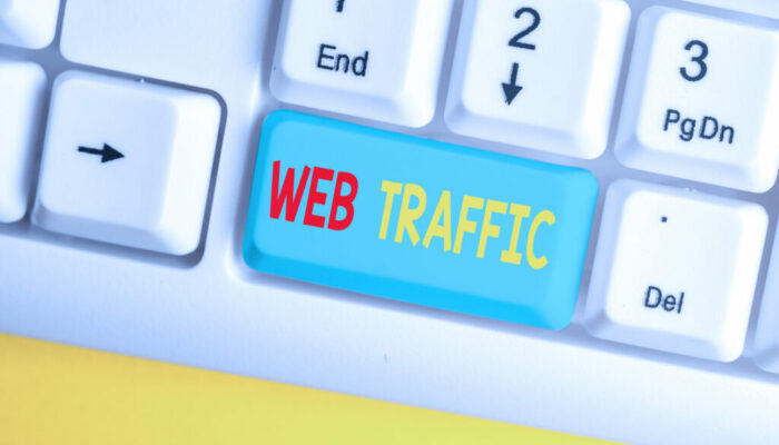 Word writing text Web Traffic. Business photo showcasing Amount of data sent and received by visitors to a website White pc keyboard with empty note paper above white background key copy space